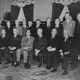 That's President-elect Eisenhower in the middle of his cabinet in 1953. Directly to his right is Nixon, and all the way on his left is Charlie Wilson, sitting closest to camera. He seems chuffed.